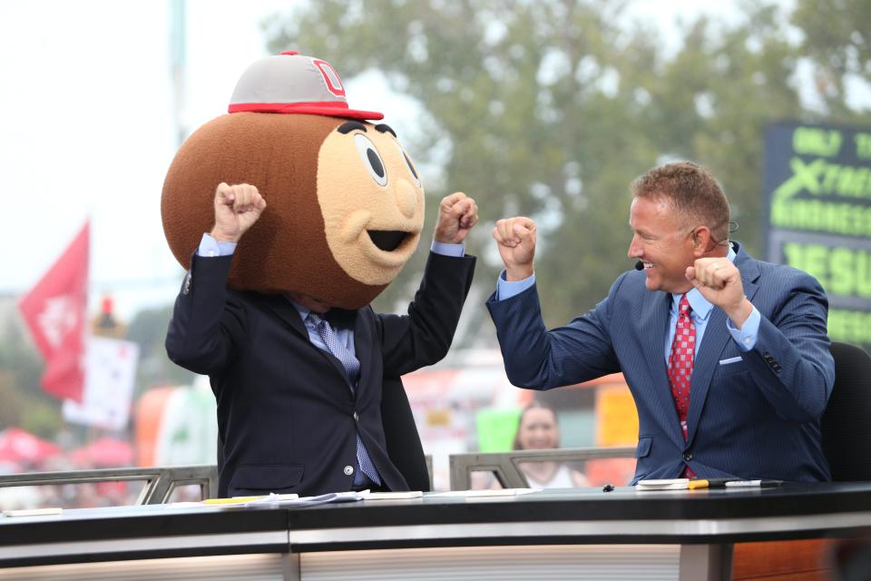 September 3, 2022; Columbus, Ohio, USA; Sports analyst, Lee Corso, dances with analyst and former Ohio State Buckeye, Kirk Herbstreit, after selecting the Ohio State Buckeye to win over Notre Dame as his GameDay pick during the College GameDay broadcast in Columbus, Ohio on Sept. 3, 2022; Columbus, OH, USA;  Mandatory Credit: Maddie Schroeder/Columbus Dispatch