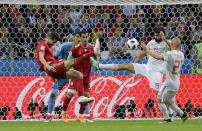 <p>Milad Mohammadi clears the ball away from Diego Costa as David Silva watches on </p>