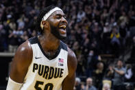 Purdue forward Trevion Williams celebrates after the team's 77-70 win over Iowa in an NCAA college basketball game in West Lafayette, Ind., Friday, Dec. 3, 2021. (AP Photo/Michael Conroy)