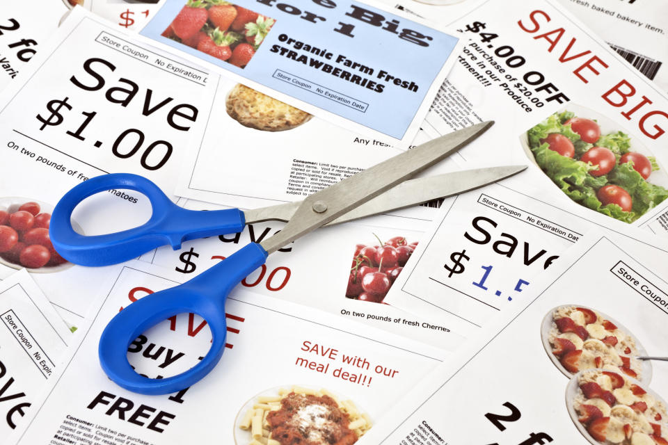 Fake coupon background with Scissors.  All coupons were created by the photographer.  Images in the coupons are the photographers work and are included in the release.