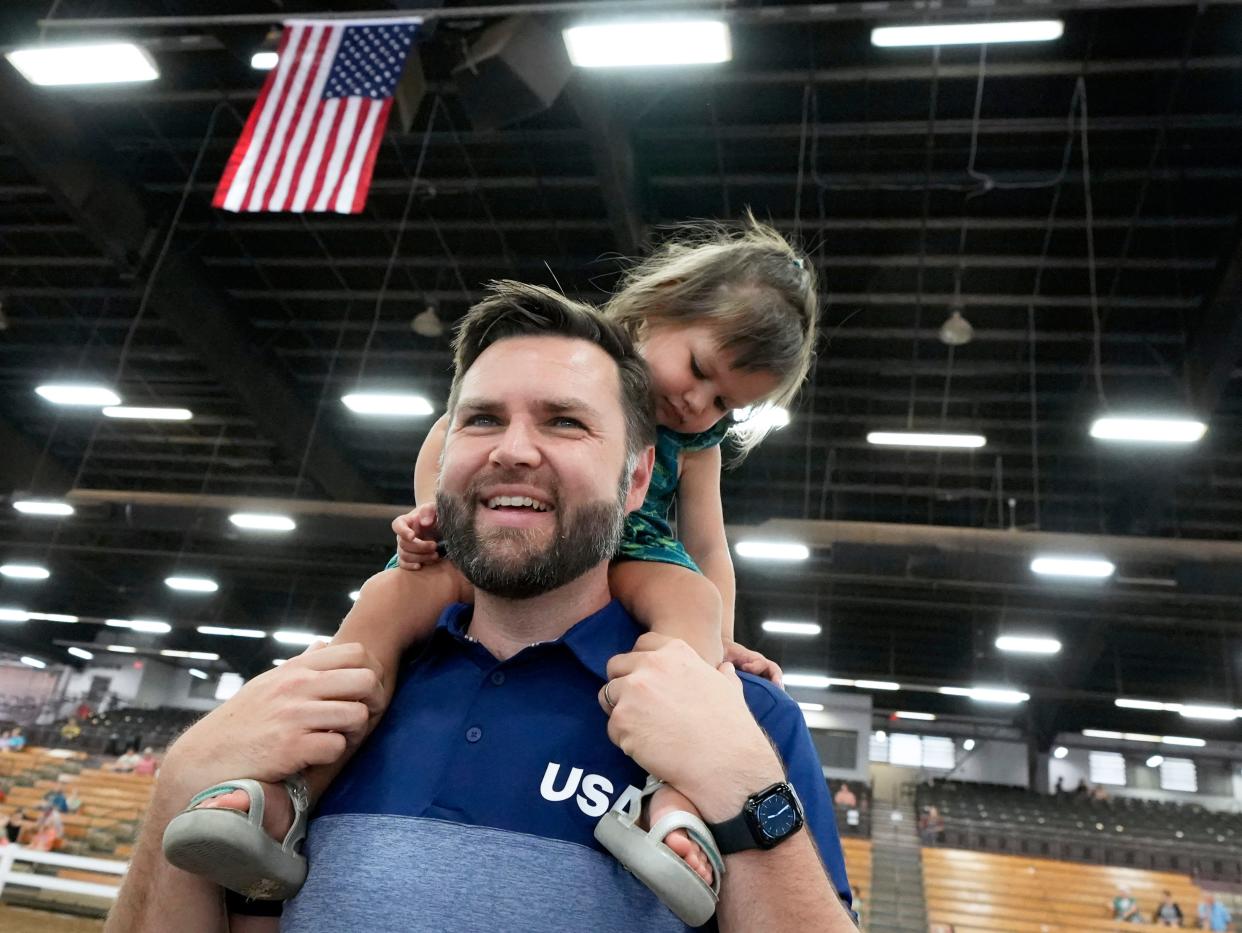 Sen. J.D. Vance watches Junior Market Beef Showmanship judging during a trip to the Ohio State Fair with his family on Aug. 4.