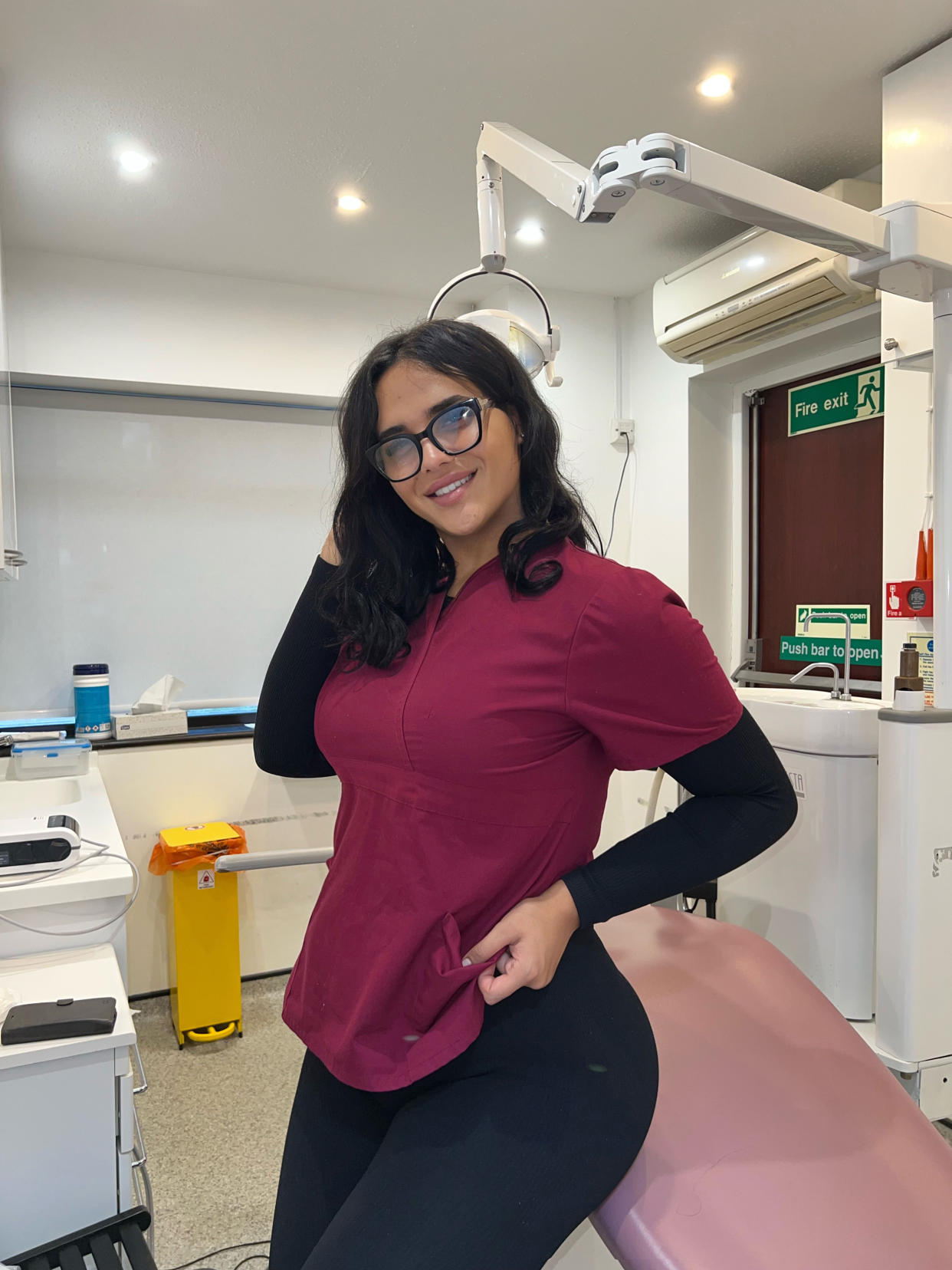 Cassie before surgery, pictured at work as dentist. (Getty Images)