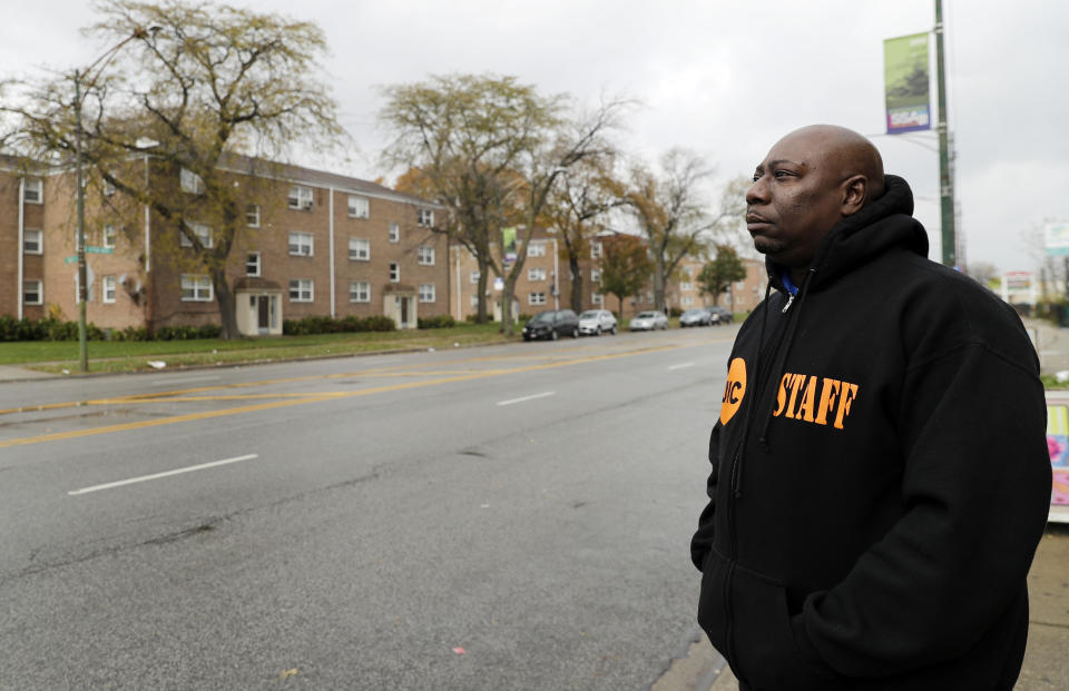 Demeatreas Whatley stands for a portrait on a street on the South Side of Chicago, Friday, Nov. 9, 2018. Whatley is a supervisor for Cure Violence, a group that works to stem gang violence. He works on the eastern edge of the 6th Police District, where police announced this fall that they had recovered their 1,000th gun this year. By December, the tally had topped 1,200. (AP Photo/Nam Y. Huh)