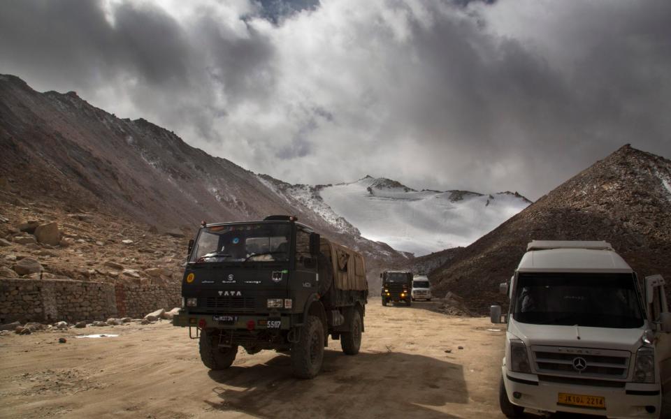 An Indian Army truck crosses Chang la pass near Pangong Lake in Ladakh region, India - Manish Swarup /AP