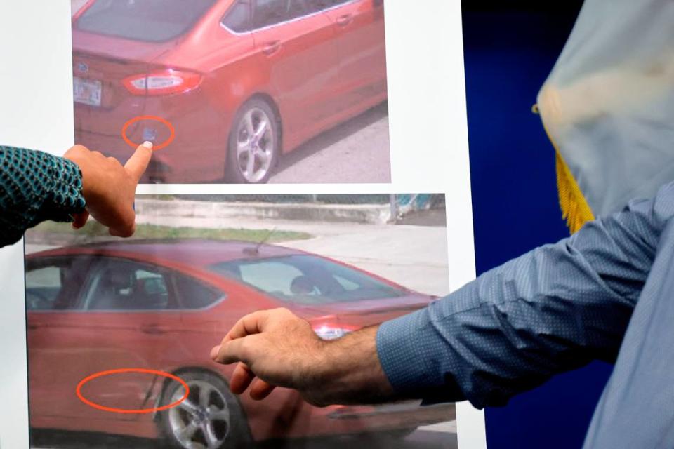 Homicide detective Leann Swisher, left, and homicide Sergeant Donald Geiger point out a sticker, top, and damage, below, on photos of the victims’ vehicle during a news conference in reference to the March 22, 2024, double homicide of 89 year old Major Melvin and 85 year old Claudette Melvin at their Fort Lauderdale home in the 600 block of SW 30 Terrace. This at the Fort Lauderdale Police Department in Fort Lauderdale on Wednesday, April 3, 2024. (Amy Beth Bennett / South Florida Sun Sentinel)