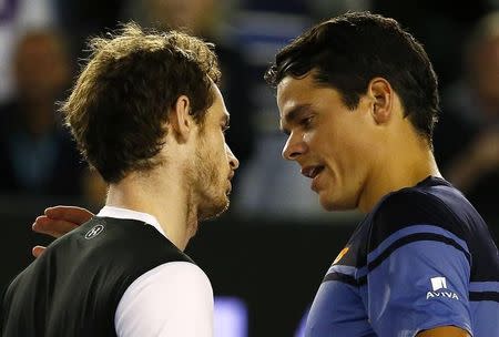 Britain's Andy Murray (L) and Canada's Milos Raonic speak at the net after Murray won their semi-final match at the Australian Open tennis tournament at Melbourne Park, Australia, January 29, 2016. REUTERS/Thomas Peter