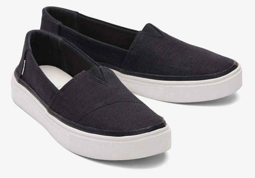 the pair of slip ons in black linen