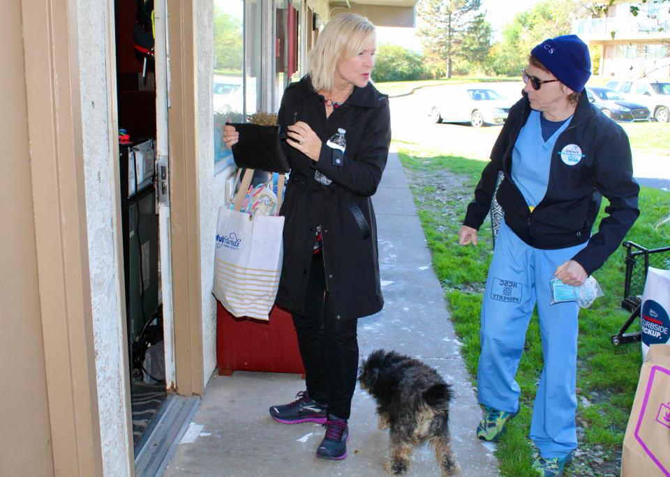 Lt. Gov. Bethany Hall-Long, left, and Dr. Sandra Gibney, stand outside a room at the Best Night Inn near New Castle on Thursday, Nov. 2, 2023, during an outreach event.