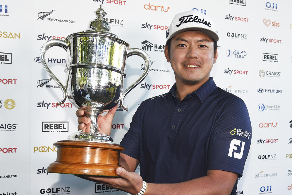 Japan's Takahiro Hataji holds his trophy after winning the New Zealand Golf Open at the Millbrook Resort, in Arrowtown, New Zealand, Sunday, March 3, 2024. (Chris Symes/Photosport via AP)