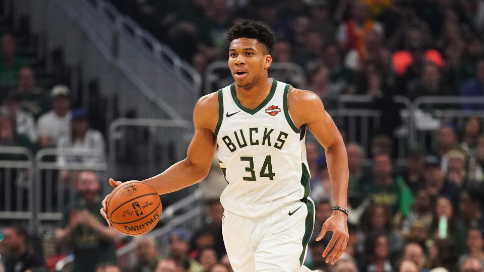 Milwaukee Bucks' Giannis Antetokounmpo dribbles during the first half of Game 5 of the NBA Eastern Conference basketball playoff finals against the Toronto Raptors Thursday, May 23, 2019, in Milwaukee. (AP Photo/Morry Gash)