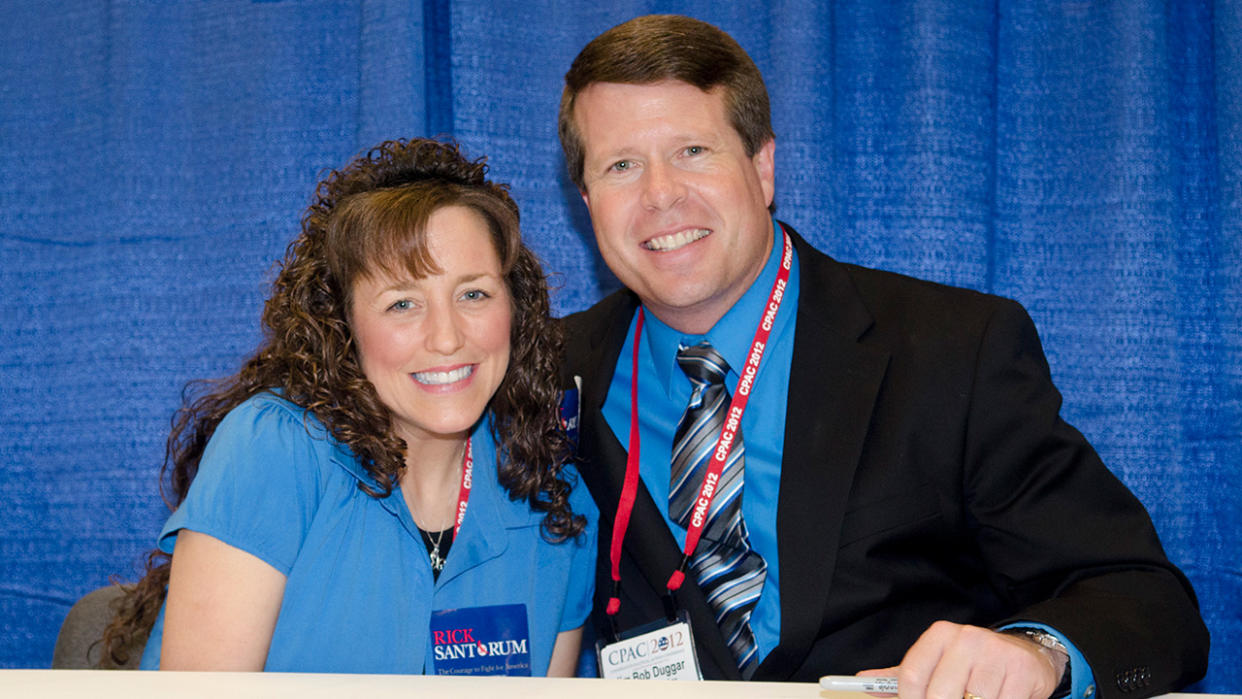  Jim Bob and Michelle at 2012 event, smiling. 