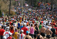 Runners start the 116th running of the Boston Marathon, in Hopkinton, Mass., Monday, April 16, 2012. (AP Photo/Stew Milne)