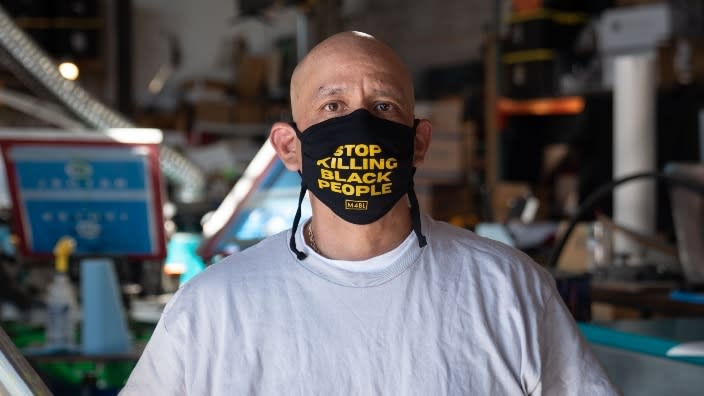 Movement Ink owner René Quiñonez created thousands of masks with Black Lives Matter-themed slogans meant to be shipped across the nation to protect protesters from COVID-19. (Photo: J. Justin Wilson/Institute for Justice)