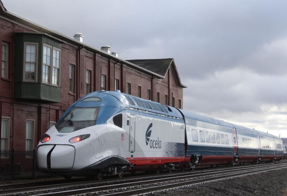 The Acela high-speed train produced by Alstom glides past the Erie Depot Museum as it departs Hornell Wednesday morning, bound for delivery to Amtrak.