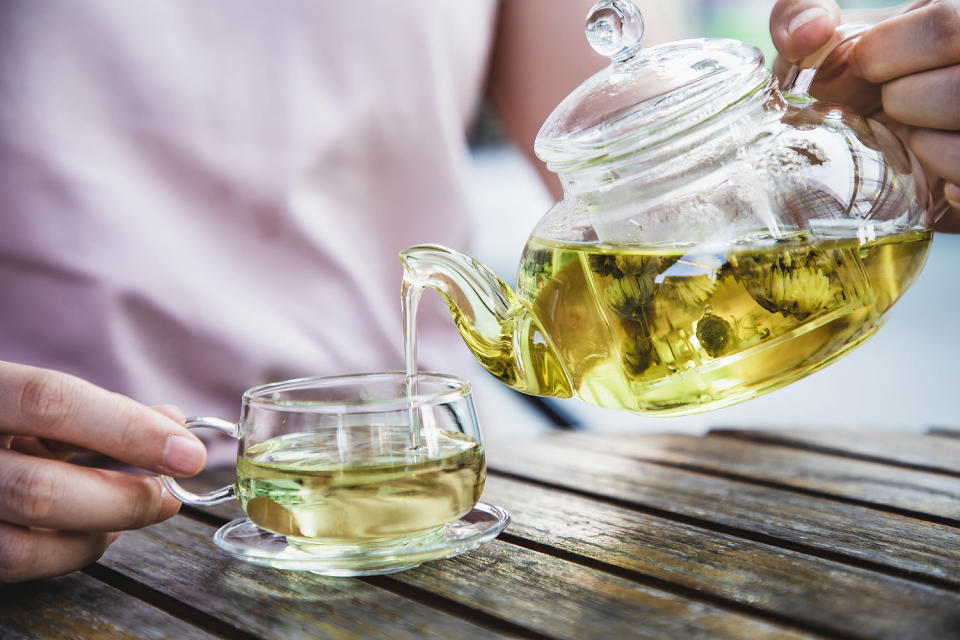 Pouring a cup of herbal tea. (Kilito Chan / Getty Images)