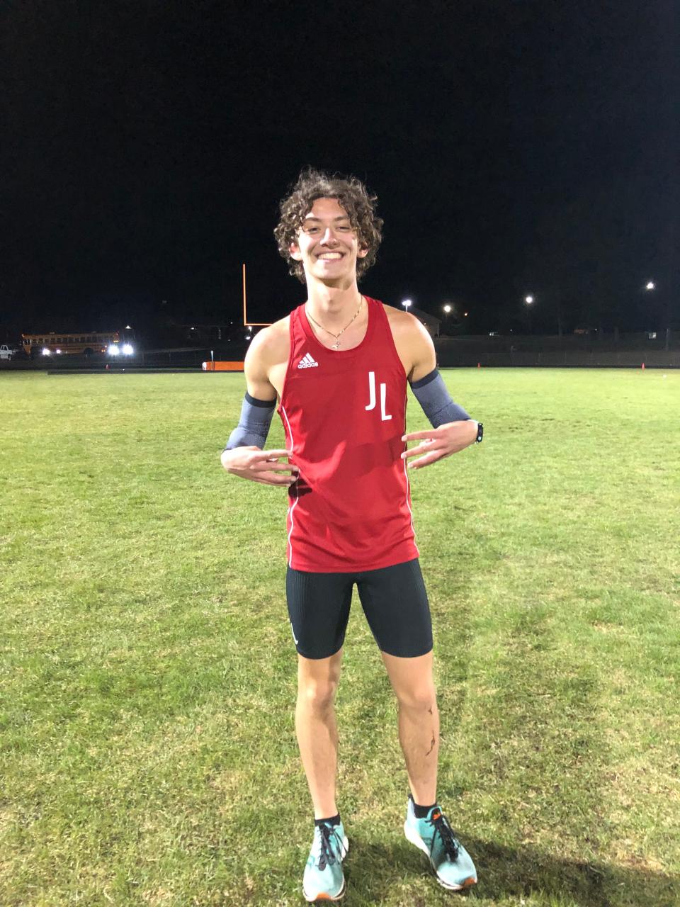 Malaki Gascho poses after setting a new school record in the 3200-meter run at the Mancelona Invite on Friday, April 21.