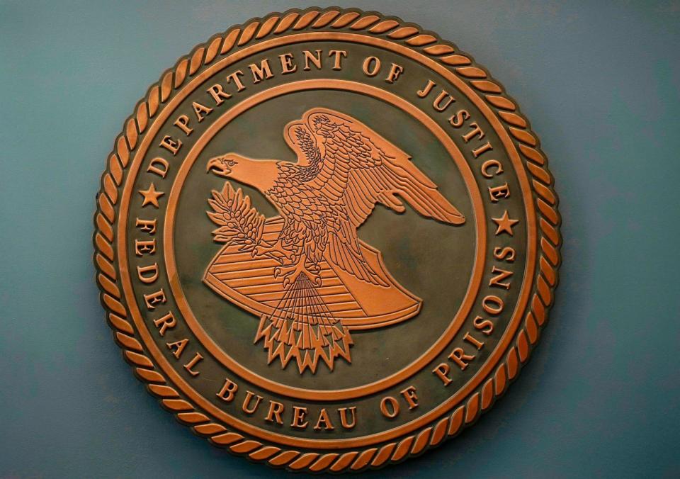 PHOTO: The seal for the Federal Bureau of Prisons is seen at Federal Bureau of Prisons headquarters in Washington, Oct. 24, 2022.  (Carolyn Kaster/AP, FILE)