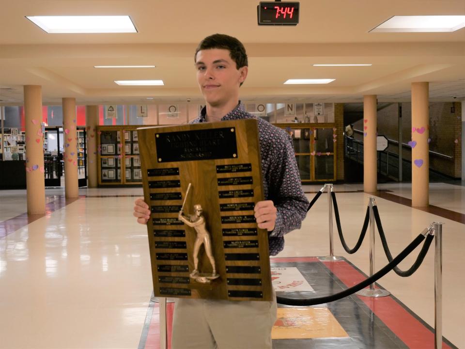 Tascosa's Brady Keeter poses with a plaque adding his name to the list of Randy Keller Fighting Heart scholarship winners on Tuesday, May 9, 2023 at Tascosa High School.