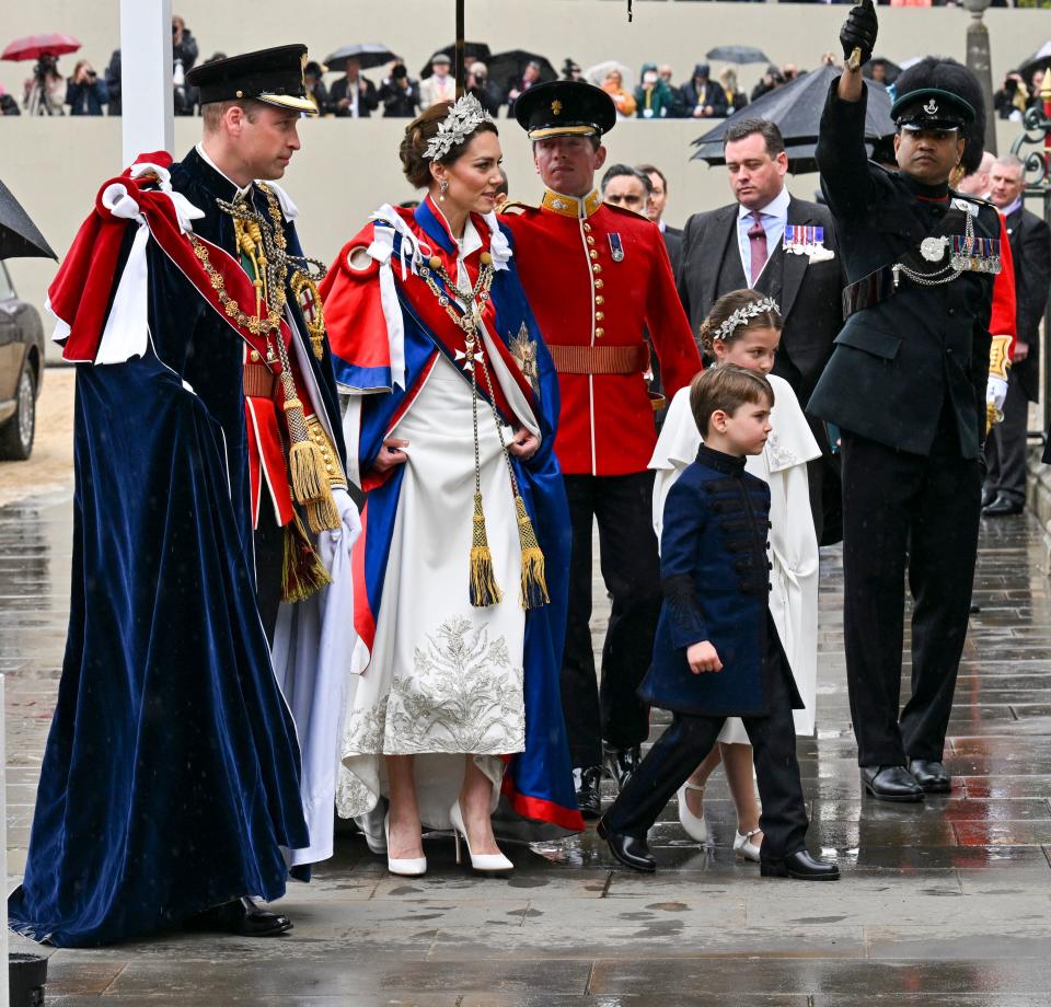 Britain's Prince William, Prince of Wales, Britain's Catherine, Princess of Wales, Britain's Princess Charlotte of Wales and Britain's Prince Louis of Wales arrive at Westminster Abbey in central London on May 6, 2023, ahead of the coronations of Britain's King Charles III and Britain's Camilla, Queen Consort. - The set-piece coronation is the first in Britain in 70 years, and only the second in history to be televised. Charles will be the 40th reigning monarch to be crowned at the central London church since King William I in 1066. Outside the UK, he is also king of 14 other Commonwealth countries, including Australia, Canada and New Zealand. Camilla, his second wife, will be crowned queen alongside him, and be known as Queen Camilla after the ceremony. (Photo by Andy Stenning / POOL / AFP) (Photo by ANDY STENNING/POOL/AFP via Getty Images)