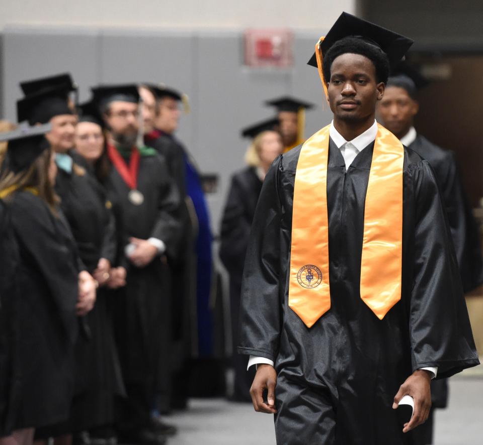 Graduates enter the gymnasium at Shelton State for the spring commencement on May 5, 2023. Nearly 200 graduates participated in the ceremony.