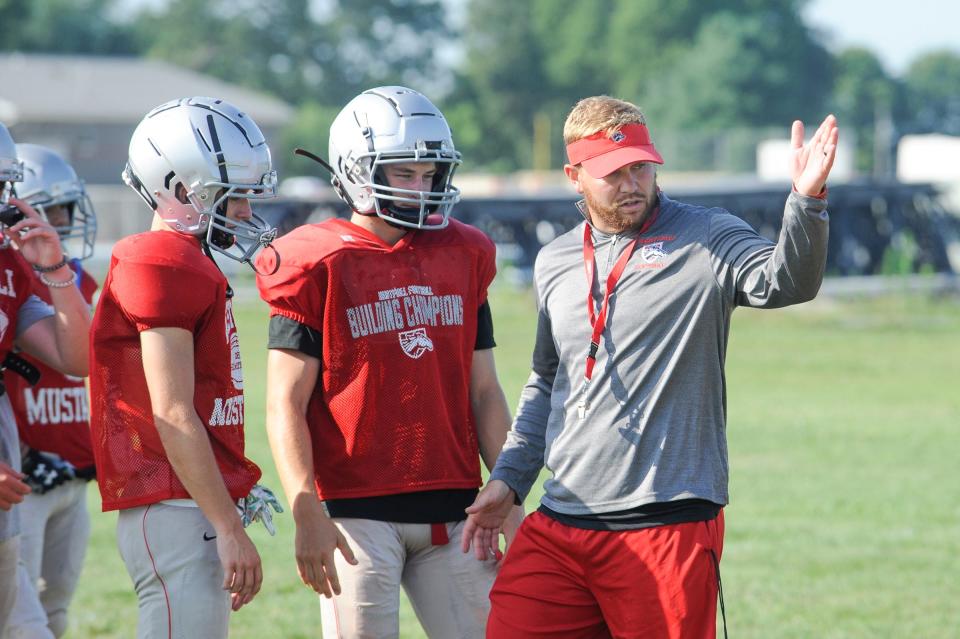 The Westfall Mustangs practice on a hot Wednesday morning during the first official practices of the football season.