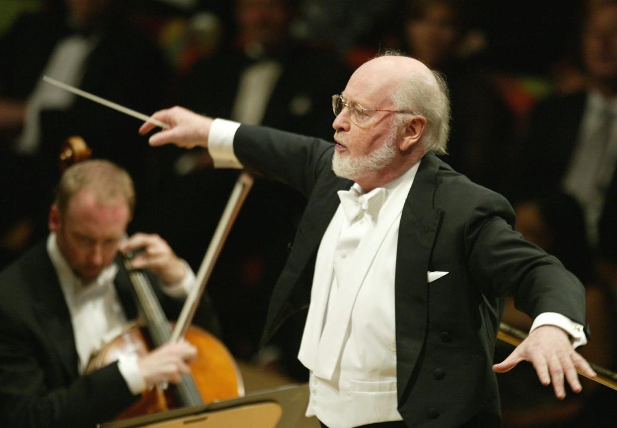 Composer John Williams conducts at the Walt Disney Concert Hall opening gala, Oct. 25, 2003, in Los Angeles, Calif. <a href="https://www.gettyimages.com/detail/news-photo/composer-john-williams-performs-on-stage-at-the-walt-disney-news-photo/2650695" rel="nofollow noopener" target="_blank" data-ylk="slk:Carlo Allegri/Getty Images for LAPA;elm:context_link;itc:0;sec:content-canvas" class="link ">Carlo Allegri/Getty Images for LAPA</a>