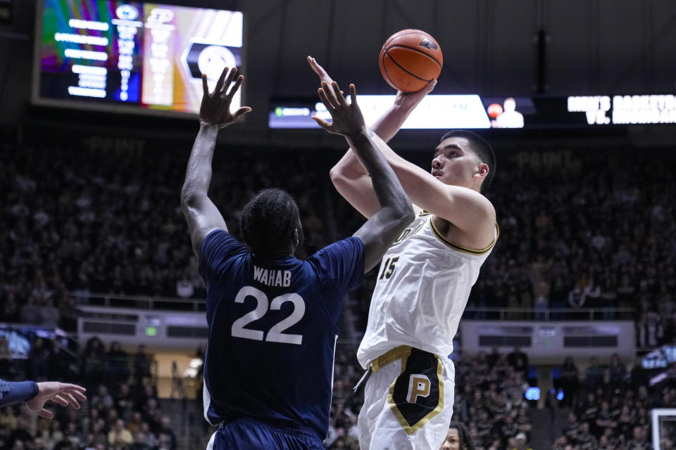 Purdue center Zach Edey (15) shoots over Penn State forward Qudus Wahab (22) during the second half of an NCAA college basketball game in West Lafayette, Ind., Saturday, Jan. 13, 2024. (AP Photo/Michael Conroy)
