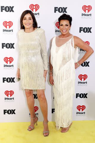 <p>Jesse Grant/Getty</p> 'Golden Hour' cohosts Kathy Swarts (left) and Susan Noles at the 2024 iHeartRadio Music Awards in Los Angeles