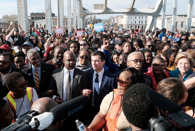 Participants cross the Edmund Pettus Bridge in Selma to commemorate "Bloody Sunday" march anniversary