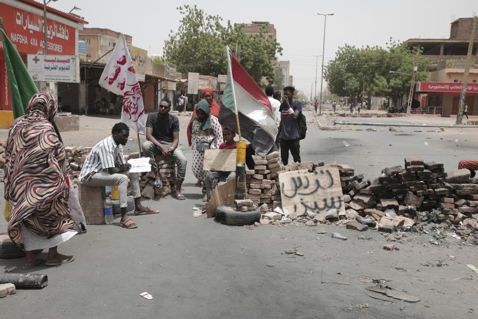 People stage a sit-in demanding a return to civilian rule and to protest the nine people who were killed in anti-military demonstrations last month, in Khartoum, Sudan, Monday, July 4, 2022. (AP Photo/Marwan Ali)