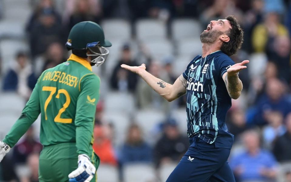  England bowler Reece Topley celebrates after taking the wicket of Rassie van der Dussen - GETTY IMAGES