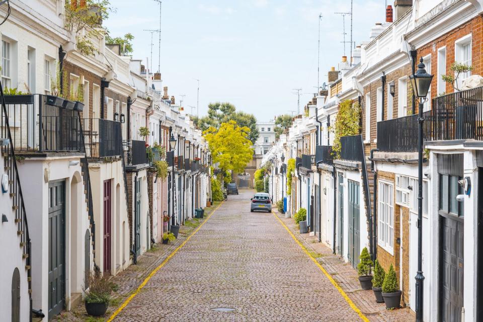 a street lined with buildings in holland park