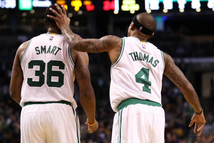 Marcus Smart and Isaiah Thomas could both be free agents in 2018. Will the Celtics pay both of them? (Getty)