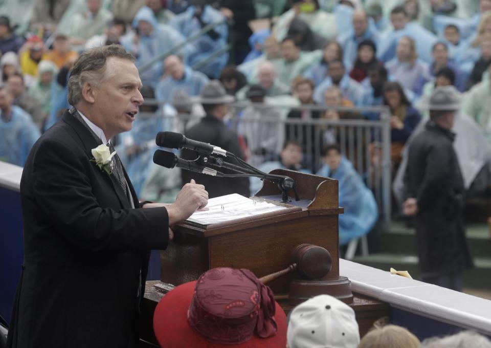 Virginia Governor Terry McAuliffe delivers his inaugural address on the steps of the South Portico of the Capitol in Richmond, Va., Saturday, Jan. 11, 2014. McAuliffe was sworn in as the 72nd Governor of Virginia. (AP Photo/Steve Helber)