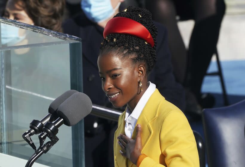 FILE - In this Wednesday, Jan. 20, 2021, file photo, Amanda Gorman delivers a poem after Joe Biden was sworn in as the 46th president of the United States, at the U.S. Capitol in Washington. Gorman, the 22-year-old poet who stirred America at the inauguration of President Joseph Biden, again commanded the spotlight on one of the country's biggest stages, the Super Bowl. Gorman read an original poem Sunday, Feb. 7, 2021, during the pregame festivities in Tampa, Fla. (Erin Schaff/The New York Times via AP, Pool, File)