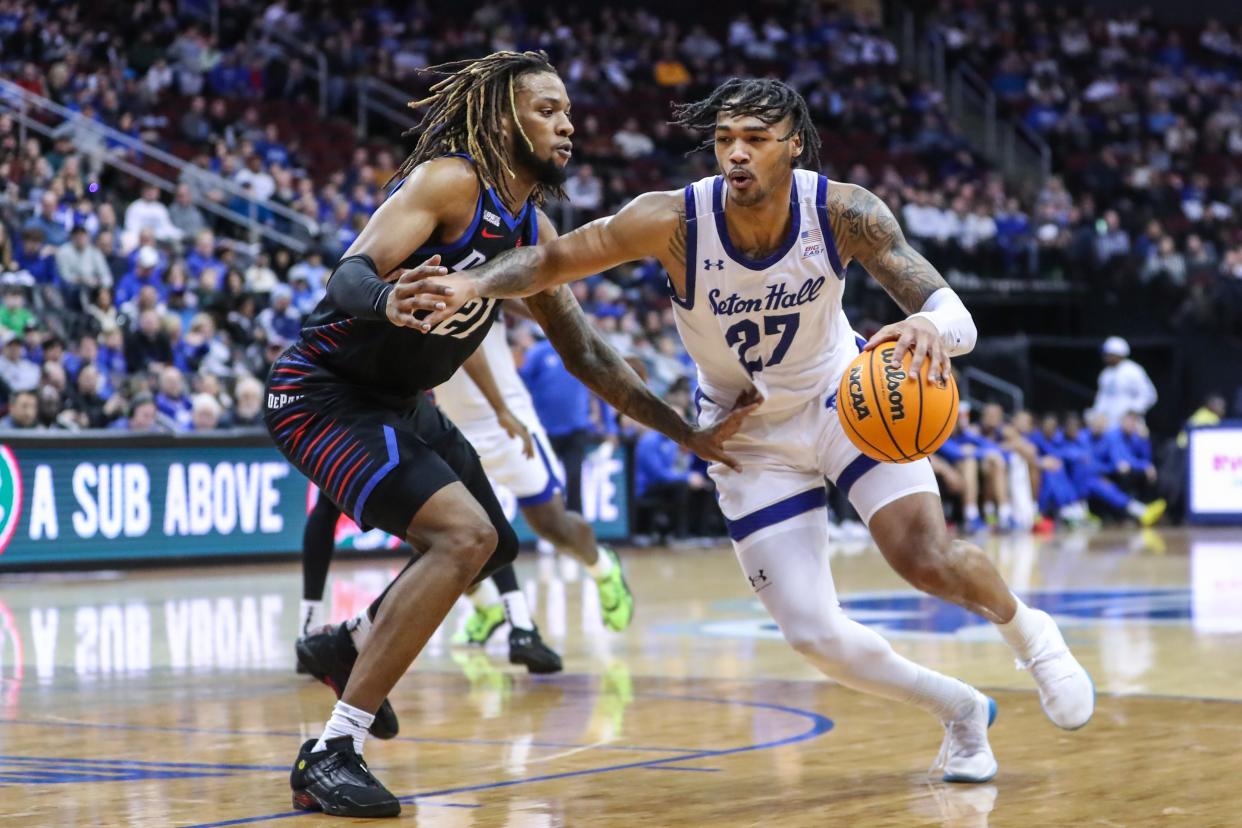 Mar 9, 2024; Newark, New Jersey, USA; Seton Hall Pirates guard Dre Davis (27) looks to drive past DePaul Blue Demons forward Da'Sean Nelson (21) in the second half at Prudential Center. Mandatory Credit: Wendell Cruz-USA TODAY Sports