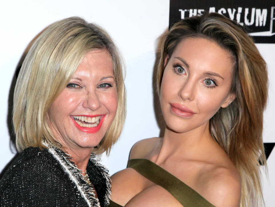 Singer Olivia Newton-John and her daughter Chloe Lattanzi on the red carpet for the Premiere of Syfy's "Dead 7" at Harmony Gold on April 1, 2016 