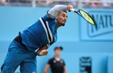 Tennis - ATP 500 - Fever-Tree Championships - The Queen's Club, London, Britain - June 19, 2018 Australia's Nick Kyrgios in action during his first round match against Great Britain's Andy Murray Action Images via Reuters/Tony O'Brien