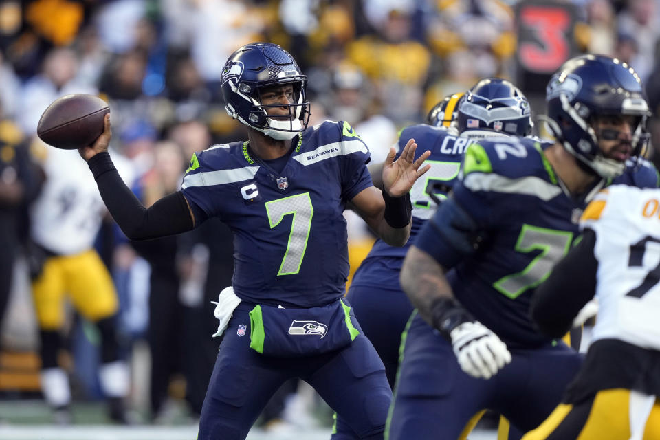 Seattle Seahawks quarterback Geno Smith (7) passes against the Pittsburgh Steelers in the first half of an NFL football game Sunday, Dec. 31, 2023, in Seattle. (AP Photo/Stephen Brashear)