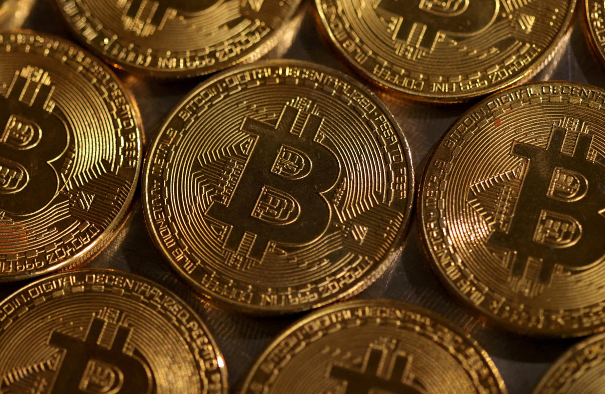 FILE PHOTO: Representations of cryptocurrency Bitcoin are seen in this illustration, August 10, 2022. REUTERS/Dado Ruvic/Illustration/File Photo