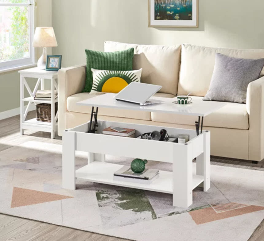 White lift top table in living room space