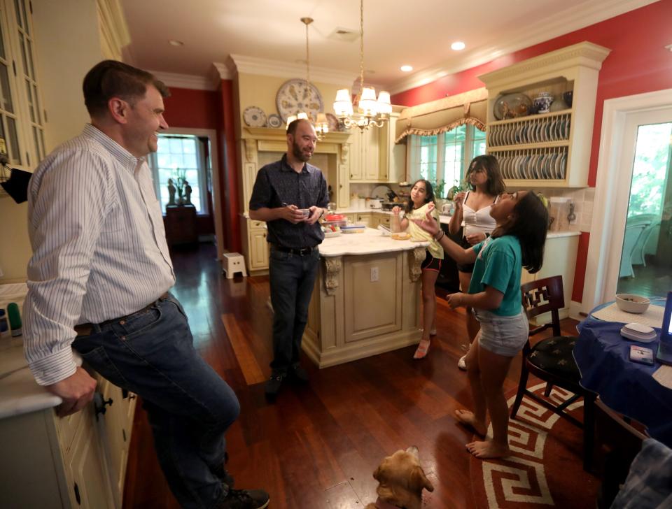 Edward Van Saders and Paul Shusterman, shown with their 11-year old daughters Aria, Vivian and Sidney, in their home in Sparkill, N.Y. Van Saders said he feels like they are the luckiest family in the world. "Our family couldn't exist just a generation ago," he said.
