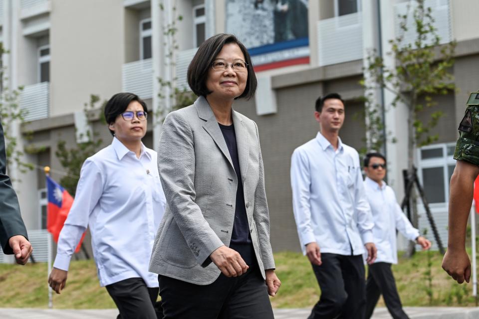 Taiwanese President Tsai Ing-wen (C) arrives at a military base in Hsinchu, northern Taiwan on September 10, 2019, to attend a ceremony for the base's new dormitory named Yue Shiang Luo. - This dormitory can accomodate nearly one thousand soldiers. (Photo by Sam YEH / AFP)        (Photo credit should read SAM YEH/AFP/Getty Images)