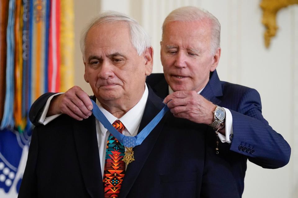 President Joe Biden awards the Medal of Honor to Spc. Dwight Birdwell for his actions on Jan. 31, 1968, during the Vietnam War, during a ceremony in the East Room of the White House, Tuesday, July 5, 2022, in Washington. (AP Photo/Evan Vucci)