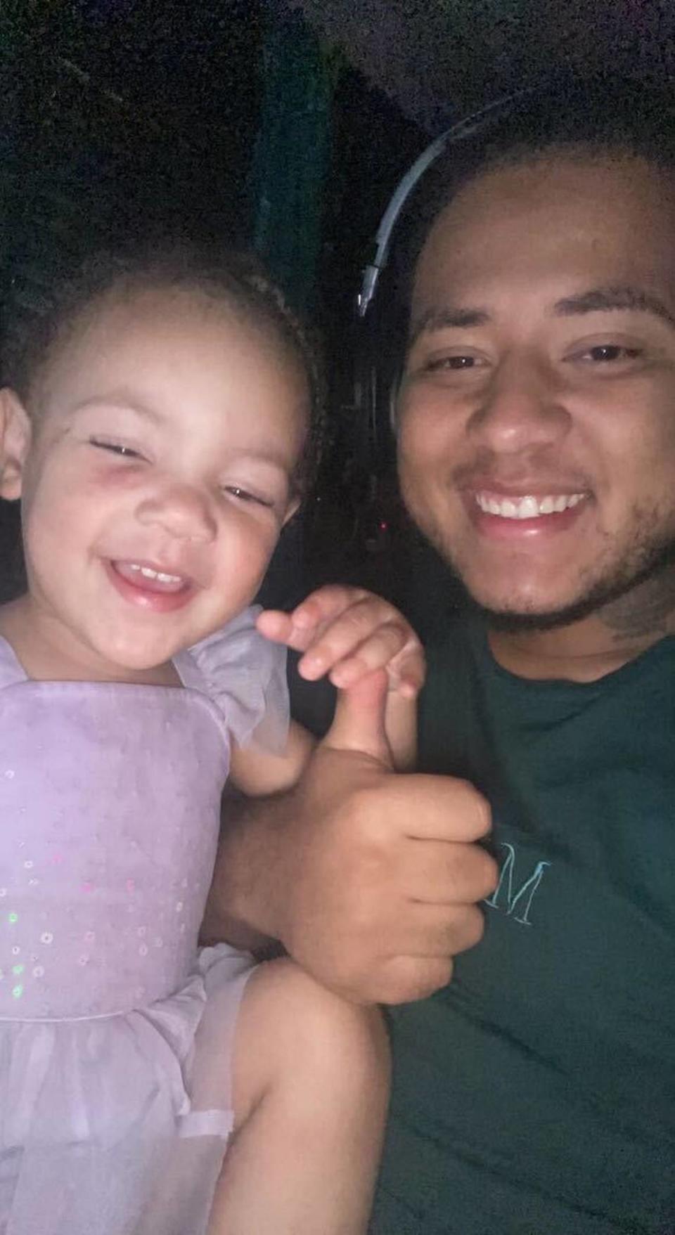 Romeo Xavier Portillo with his daughter Nilayah.