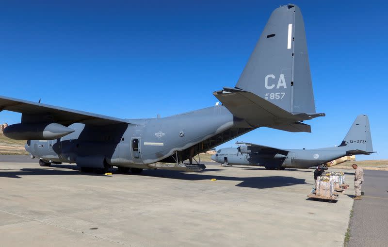 A view shows aid packages to be loaded into a plane in Zarqa