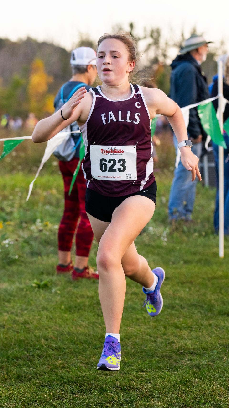 Menomonee Falls' Kelci Wunschel competes in the JV girls race at the 43rd annual Port Washington Cross Country Invitational in Tendick Park, Saukville, Thursday, Oct. 5, 2023.