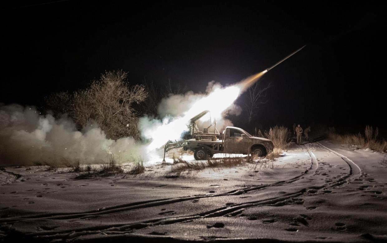 A Ukrainian missile launcher mounted on a pick-up truck fires on Russian positions near Kupiansk, Kharkiv