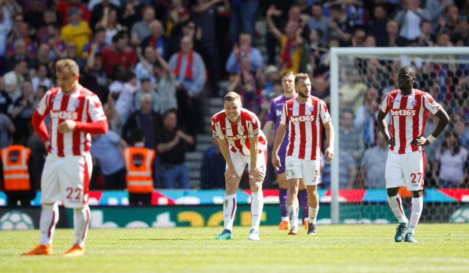 Soccer Football – Premier League – Stoke City vs Crystal Palace – bet365 Stadium, Stoke-on-Trent, Britain – May 5, 2018 Stoke City’s Ryan Shawcross and team mates react after conceding their second goal scored by Crystal Palace’s Patrick van Aanholt Action Images via Reuters/Carl Recine