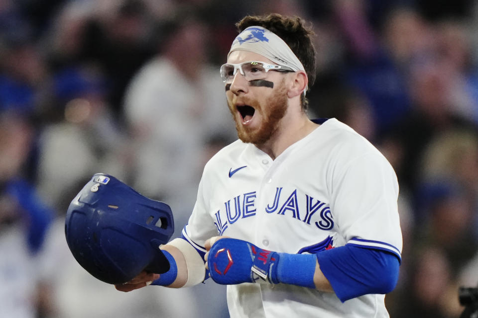 Toronto Blue Jays' Danny Jansen celebrates his game-winning, three-run home run against the New York Yankees during 10th inning of a baseball game Wednesday, May 17, 2023, in Toronto. (Frank Gunn/The Canadian Press via AP)